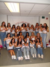 a group of women posing for a picture